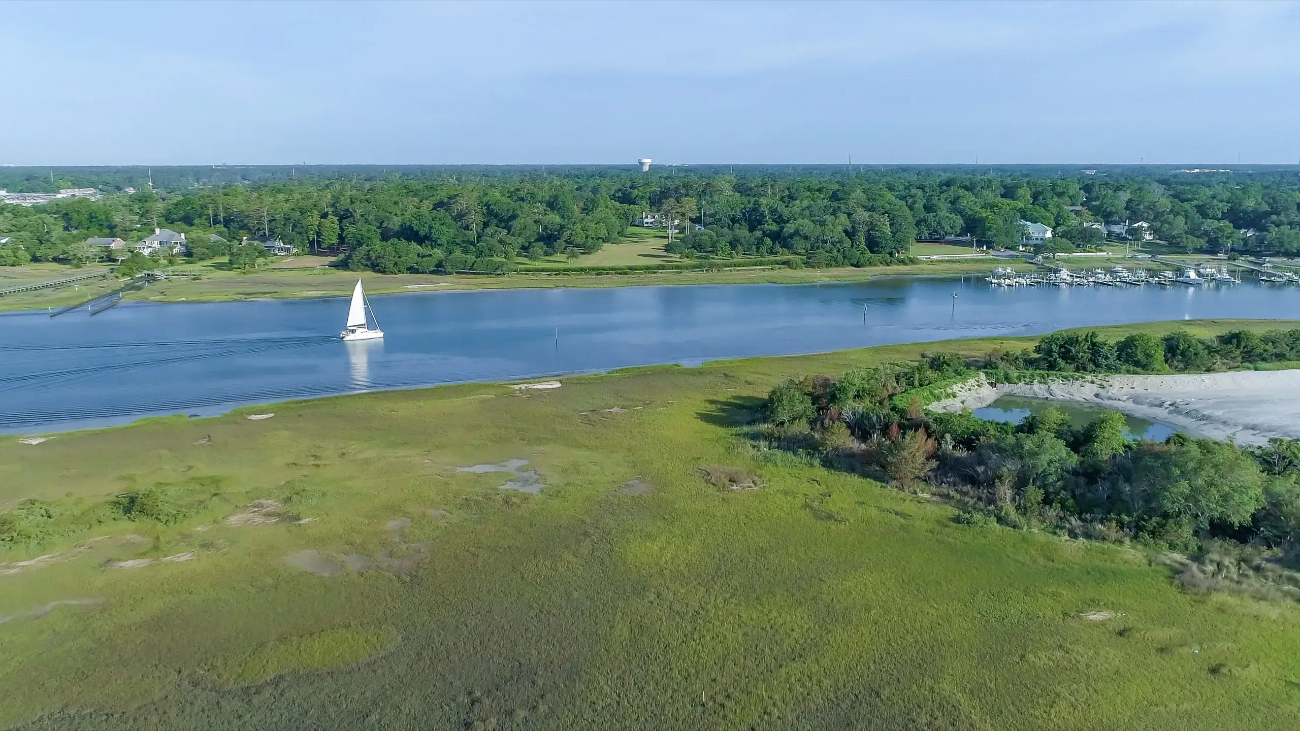 Sailboat on a waterway, dock services and waterfront upgrades